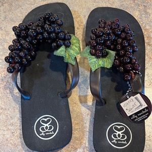 Silly sandals. Flip flops.